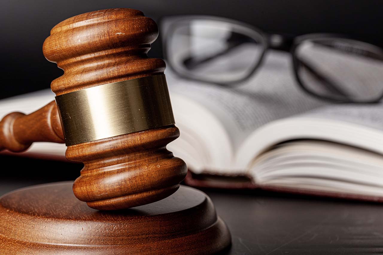 wooden-gavel-and-juridical-books-close-up-2025-02-25-09-44-43-utc